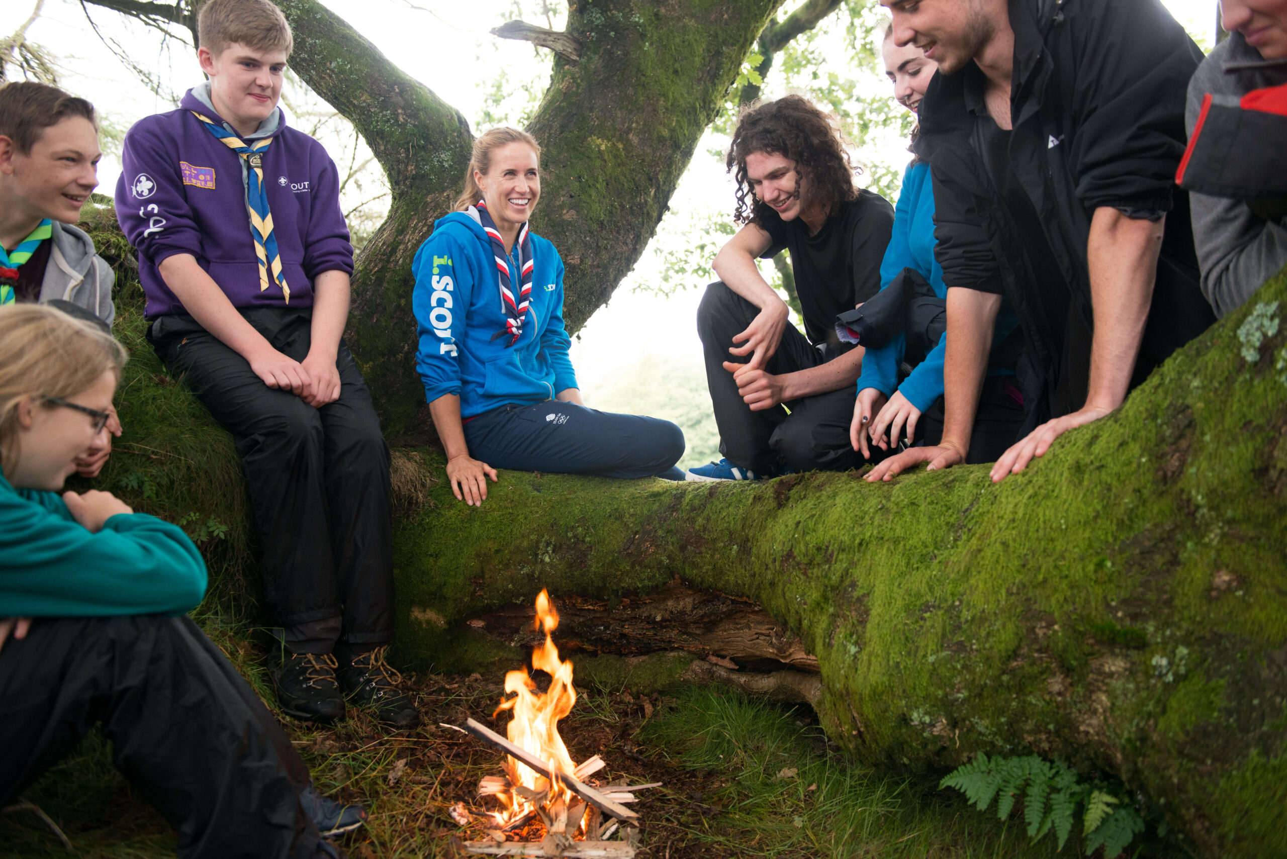 A Scout leader helping at a session